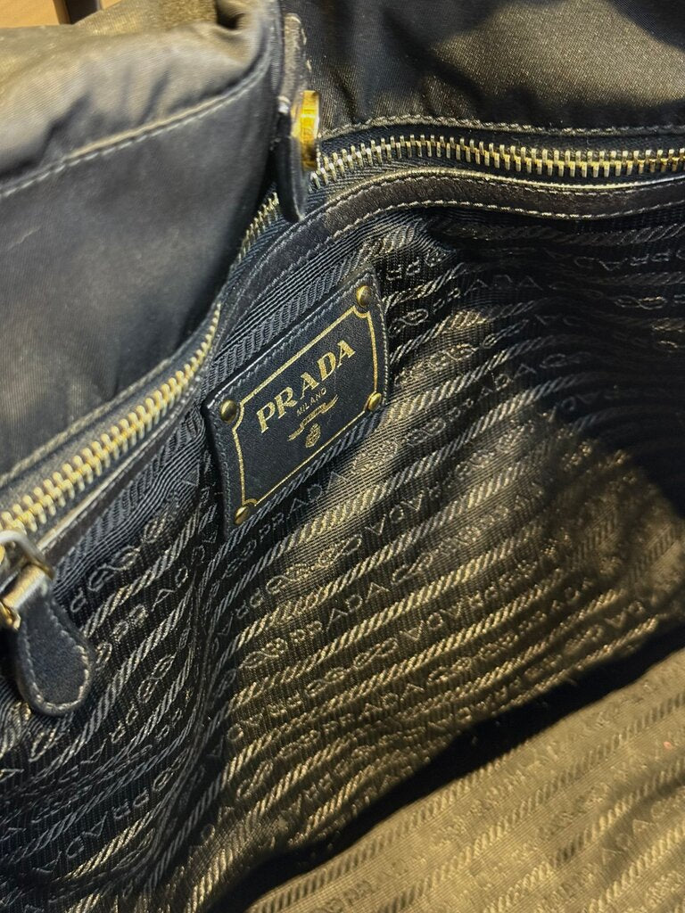 Prada Black Handbag with Gold Accents