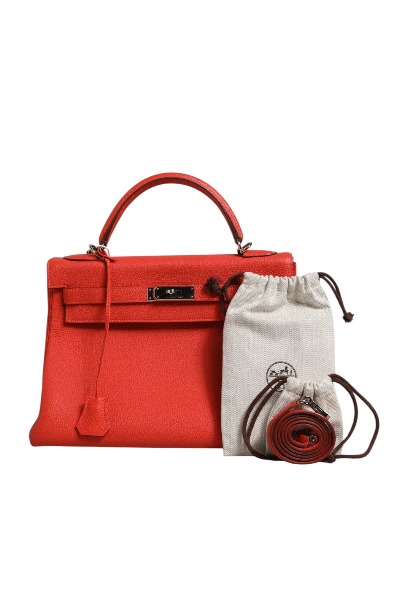 Hermès Kelly 32 Retourne Two-Way Handbag in Vibrant Orange Leather