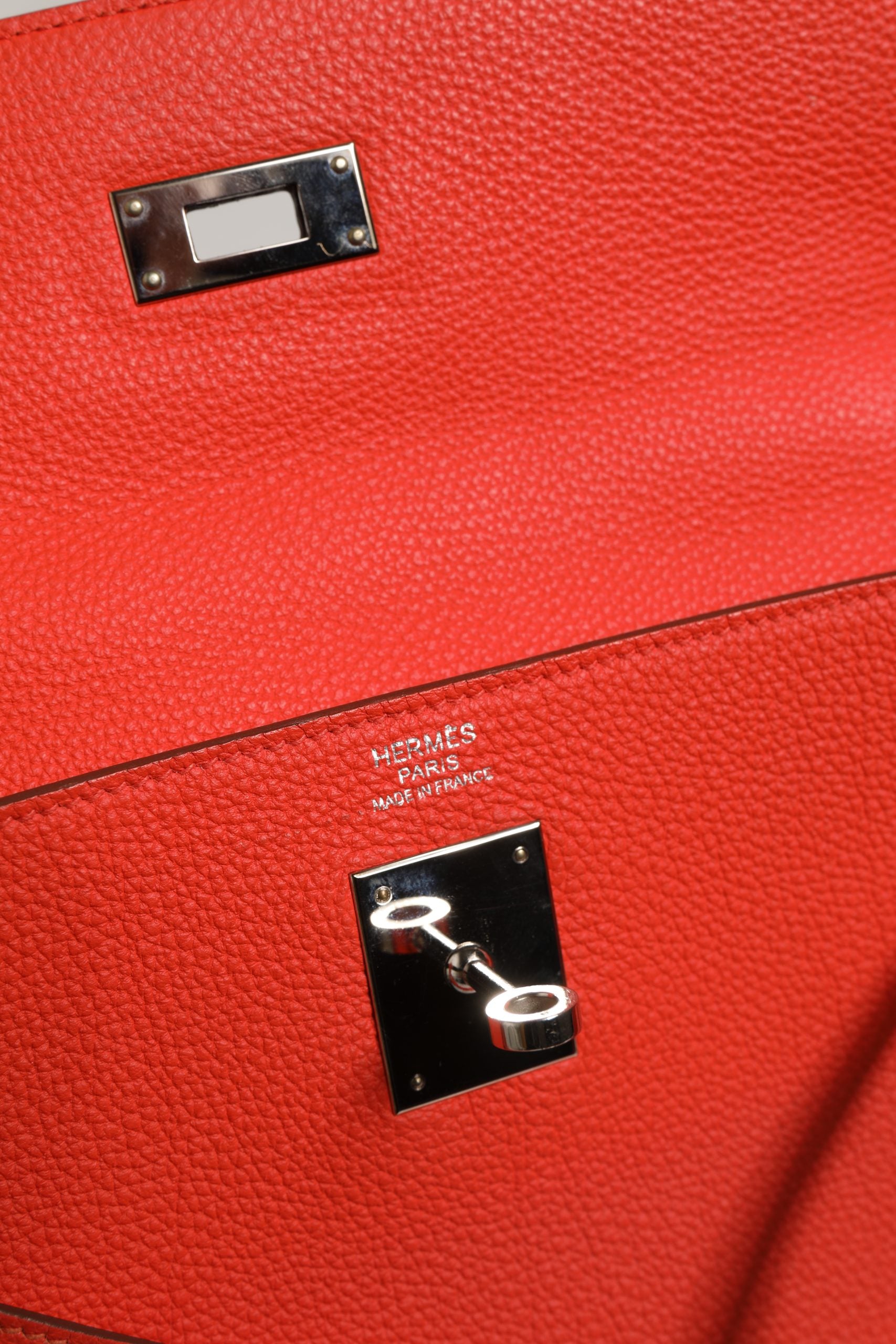 Hermès Kelly 32 Retourne Two-Way Handbag in Vibrant Orange Leather